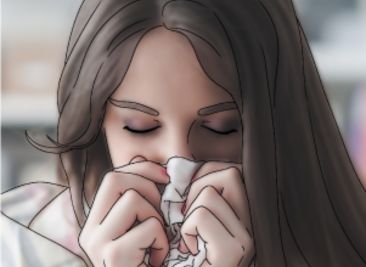 Mujer jóven sonándose la nariz por secreción nasal constante